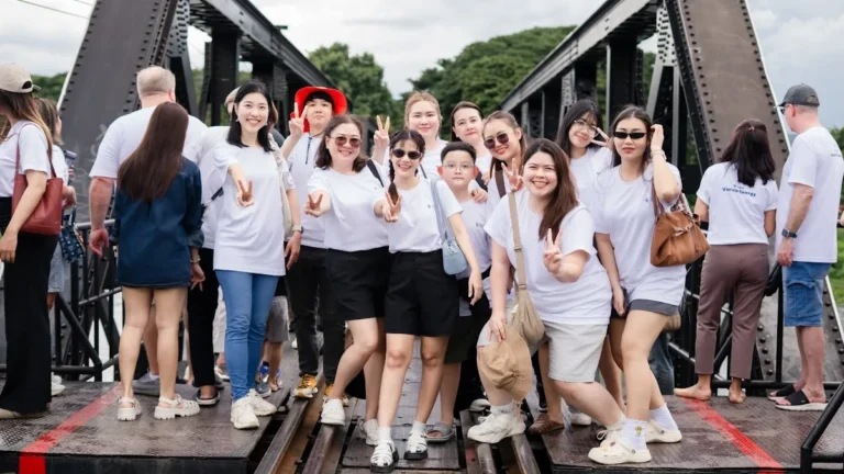 Group trip photo on a bridge